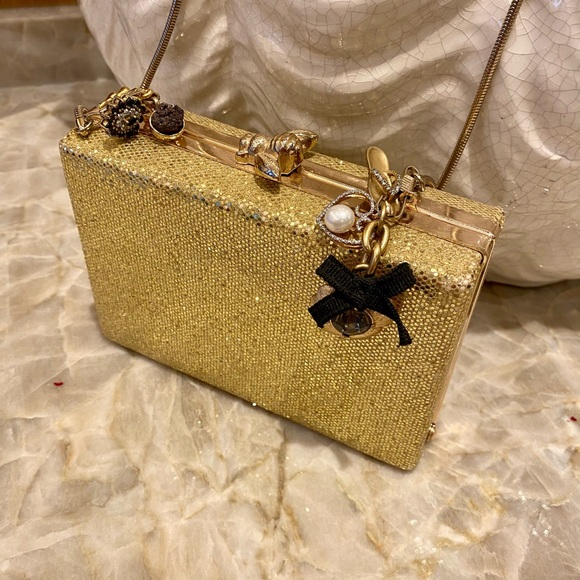 Gold evening bag with charms. - Picture 2 of 5